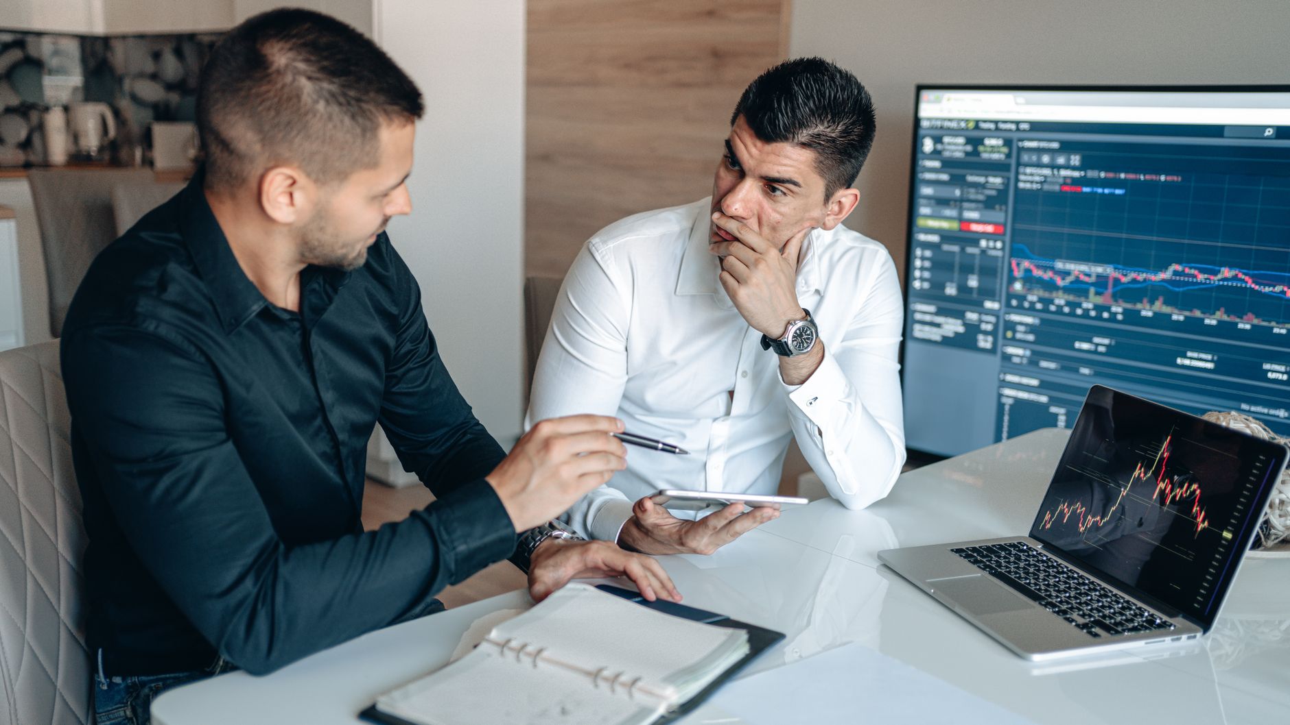 Financial specialist analyzing business process flows on site